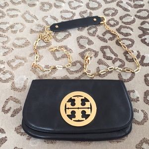 Tory Burch black leather logo clutch.